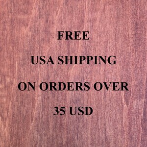 May include: A dark reddish-brown wood grain background with black text that reads: FREE USA SHIPPING ON ORDERS OVER 35 USD. The wood texture features vertical grain patterns and natural variations in color throughout the surface.