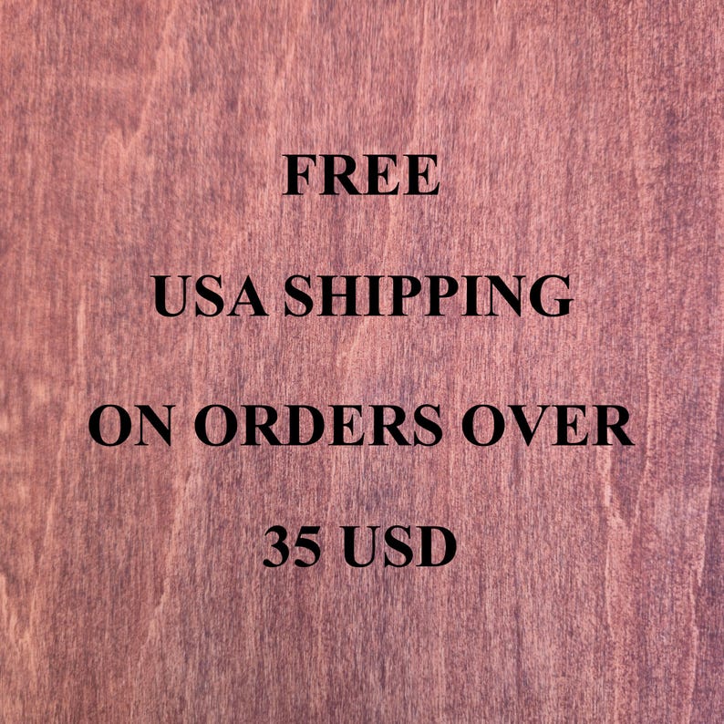 May include: A dark reddish-brown wood grain background with black text that reads: FREE USA SHIPPING ON ORDERS OVER 35 USD. The wood texture features vertical grain patterns and natural variations in color throughout the surface.
