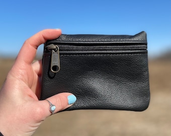 small black leather pouch