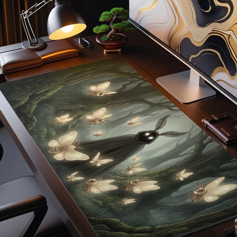 May include: A large rectangular desk mat featuring a fantasy forest scene with glowing moths and a dark, hooded figure. The color palette includes shades of green, gray, and cream, creating a mystical atmosphere. The mat is designed for use with a computer setup.