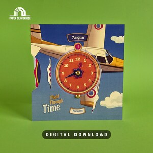 May include: A paper clock with a vintage airplane design. The clock face is orange with black numbers and hands. The text "Flight Through Time" and "Tuesday" are visible. The word "August" is also displayed.