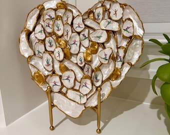Corazón de yoga de ostras