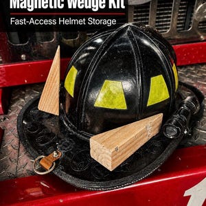 May include: A black firefighter's helmet with yellow panels and a leather rim, alongside wooden wedges and a torch. The text reads "Magnetic Wedge Kit" and "Fast-Access Helmet Storage" above the helmet.