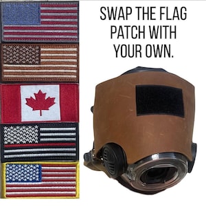 May include: A brown leather mask cover featuring a black rectangular hook-and-loop fastener patch. To the left, five rectangular embroidered flag patches are displayed, including various American and Canadian designs. Text reads: SWAP THE FLAG PATCH WITH YOUR OWN.