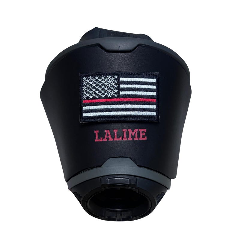 May include: A matte black tactical helmet cover featuring a rectangular embroidered patch of the American flag with a thin red line. The name LALIME is printed in red capital letters directly below the flag patch on the helmet surface.