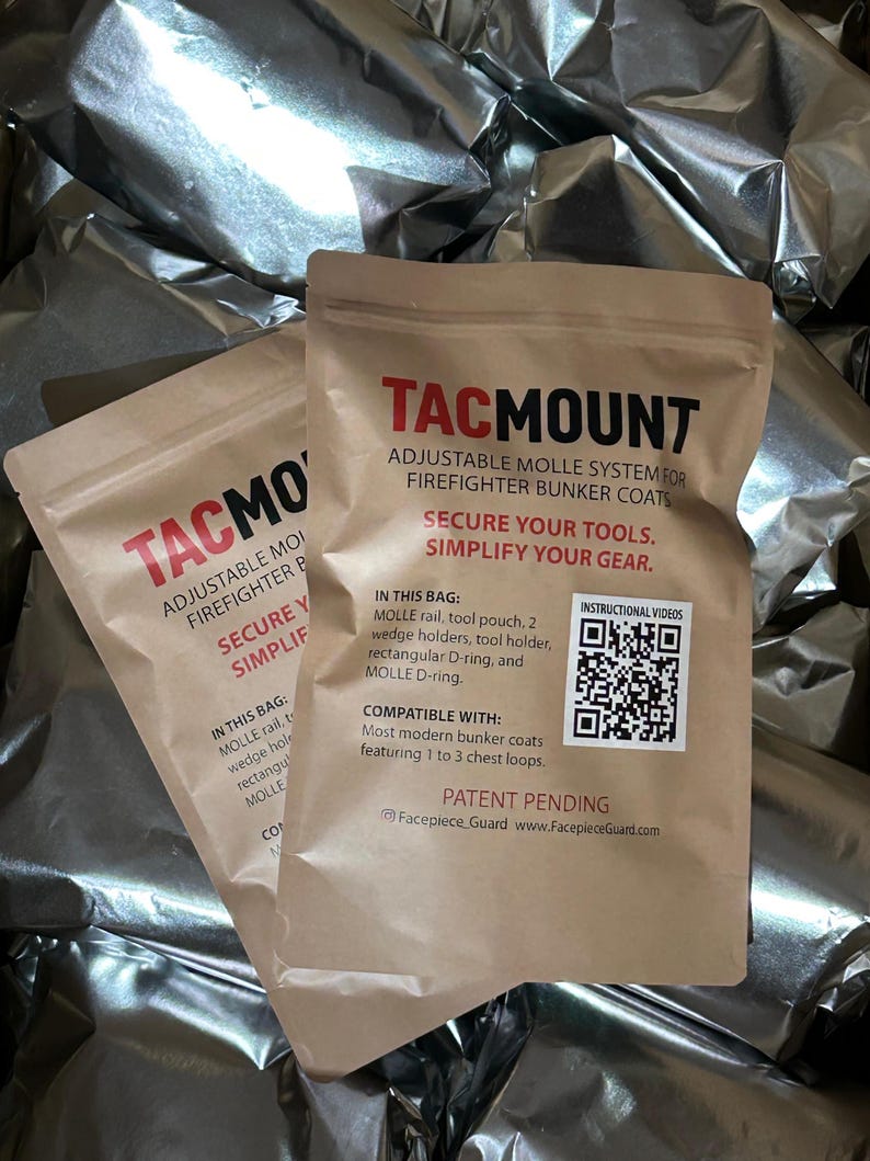 May include: Two tan paper pouches labeled TACMOUNT, an adjustable MOLLE system for firefighter bunker coats. The text reads: SECURE YOUR TOOLS. SIMPLIFY YOUR GEAR. IN THIS BAG: MOLLE rail, tool pouch, 2 wedge holders, tool holder, rectangular D-ring, and MOLLE D-ring. Includes a QR code.