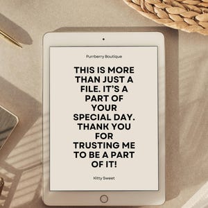 May include: A white tablet displays text from Purrberry Boutique: "THIS IS MORE THAN JUST A FILE. IT'S A PART OF YOUR SPECIAL DAY. THANK YOU FOR TRUSTING ME TO BE A PART OF IT!" by Kitty Sweet. The tablet is on a neutral surface with a pen and woven basket.