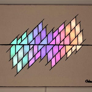 May include: Abstract geometric art piece with a neutral background. The artwork features a series of colorful, illuminated diamond shapes arranged in a symmetrical pattern, transitioning from green to purple to orange. A black line bisects the design.