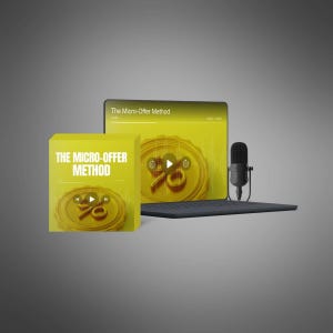 May include: A yellow box and laptop display the text "The Micro-Offer Method." The laptop screen shows a gold coin design with a play button. A black microphone is positioned to the right of the laptop.