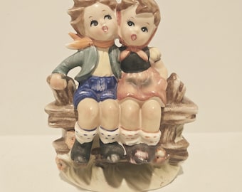 Vintage Ceramic Hummel-Like Planter with Two Children Sitting on a Fence