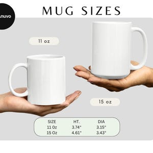 May include: Two white ceramic mugs of different sizes are displayed, held by hands. The image includes text that reads "Mug Sizes." The smaller mug is labeled 11 oz, with a height of 3.74 inches and a diameter of 3.15 inches. The larger mug is 15 oz, with a height of 4.61 inches and a diameter of 3.43 inches.