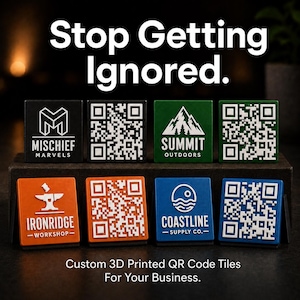 May include: Eight square 3D printed tiles arranged in two rows. The top row features black, white, green, and white tiles with logos and QR codes. The bottom row features orange, white, blue, and white tiles with logos and QR codes. Text reads Stop Getting Ignored and Custom 3D Printed QR Code Tiles For Your Business.