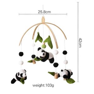 May include: A baby mobile featuring panda bears, green leaves, and white and black pom-poms. The mobile is 16.5 inches tall and 10.1 inches wide, with a weight of 3.6 ounces. The panda bears are black and white.