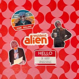 May include: A collection of stickers featuring characters and phrases from the show "Resident Alien." Stickers include an alien with the text "This is some bullshit," the show's logo, and a name tag that reads "Dr. Harry Vanderspeigle."