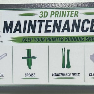 May include: A rectangular 3D printer maintenance kit box with a green dinosaur logo and the text 3D PRINTER MAINTENANCE KIT. It displays icons for lubricant oil, grease, maintenance tools, and cleaning patches with their respective labels.