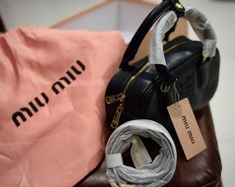 Y2k ヴィンテージ MIU MIU レザーハンドバッグ。グレーのキルティング
