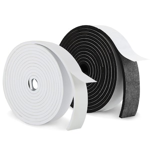 May include: Two rolls of foam tape, one white and one black, with the backing paper partially peeled back. The white roll is tightly wound, while the black roll is slightly larger in diameter. The tape appears to be self-adhesive.