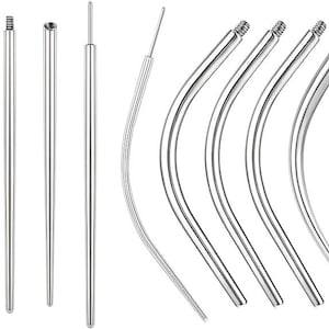 May include: An assortment of silver piercing tools, including straight and curved barbells, and insertion tapers. The tools have a polished, reflective surface, and vary in length and shape. Some have threaded ends, others are smooth and tapered.