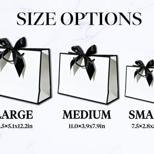 May include: White gift bags with black trim and black satin bows. The bags are labeled "LARGE", "MEDIUM", and "SMALL", with dimensions in inches. The text "SIZE OPTIONS" is at the top.