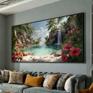 May include: A large framed canvas print depicting a tropical paradise scene. The artwork showcases a waterfall cascading into a turquoise lagoon, surrounded by lush greenery, palm trees, and vibrant red hibiscus flowers. The sky is a bright blue with fluffy white clouds.