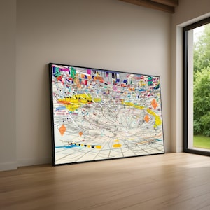 Puede incluir: Impresión de arte abstracto en un marco negro. La obra presenta una composición compleja de líneas, formas y colores, incluyendo amarillo, naranja, azul y verde. La pieza se exhibe en una habitación con suelo de madera y una ventana.