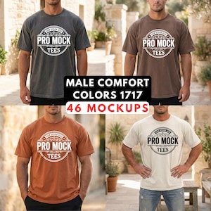 Op de afbeelding: Vier verschillende gekleurde t-shirts worden getoond: grijs, bruin, oranje en gebroken wit. Elk shirt heeft een cirkelvormig logo met de tekst "PRO MOCK TEES". De tekst "MALE COMFORT COLORS 1717 46 MOCKUPS" is ook zichtbaar.