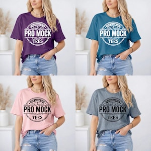 May include: Four t-shirts in different colors: purple, teal, pink, and gray. Each shirt has a round logo that says "PRO MOCK TEES" with the text "YOUR DESIGN HERE" above the logo. The shirts are worn with blue denim jeans.