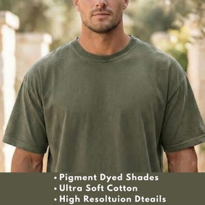 May include: Olive green pigment-dyed t-shirt made of ultra-soft cotton. The shirt has a crew neck and short sleeves. The bottom of the image has the following text: 'Pigment Dyed Shades, Ultra Soft Cotton, High Resoltuion Dteails'.