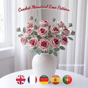 May include: A bouquet of crocheted roses in shades of pink and deep red with green leaves and stems, arranged in a plain white vase. The text Crochet Memorial Rose Pattern is visible at the top, and the handle @huyhoangbyngan is at the bottom.