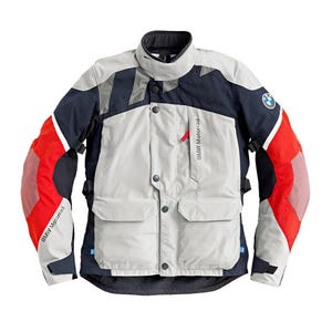 May include: A motorcycle jacket in grey, navy, and red, with the BMW Motorrad logo. The jacket has a high collar, multiple pockets, and reinforced panels on the shoulders and elbows. The sleeves have red accents and is designed for protection and style.