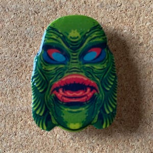 Vintage style Halloween mask Creature from the Black Lagoon pin.