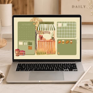 Puede incluir: Una pantalla de portátil que muestra un fondo de pantalla organizador de escritorio digital con temática de panadería. El diseño incluye un calendario de septiembre, una ilustración central de un puesto de panadería y varios iconos de comida.