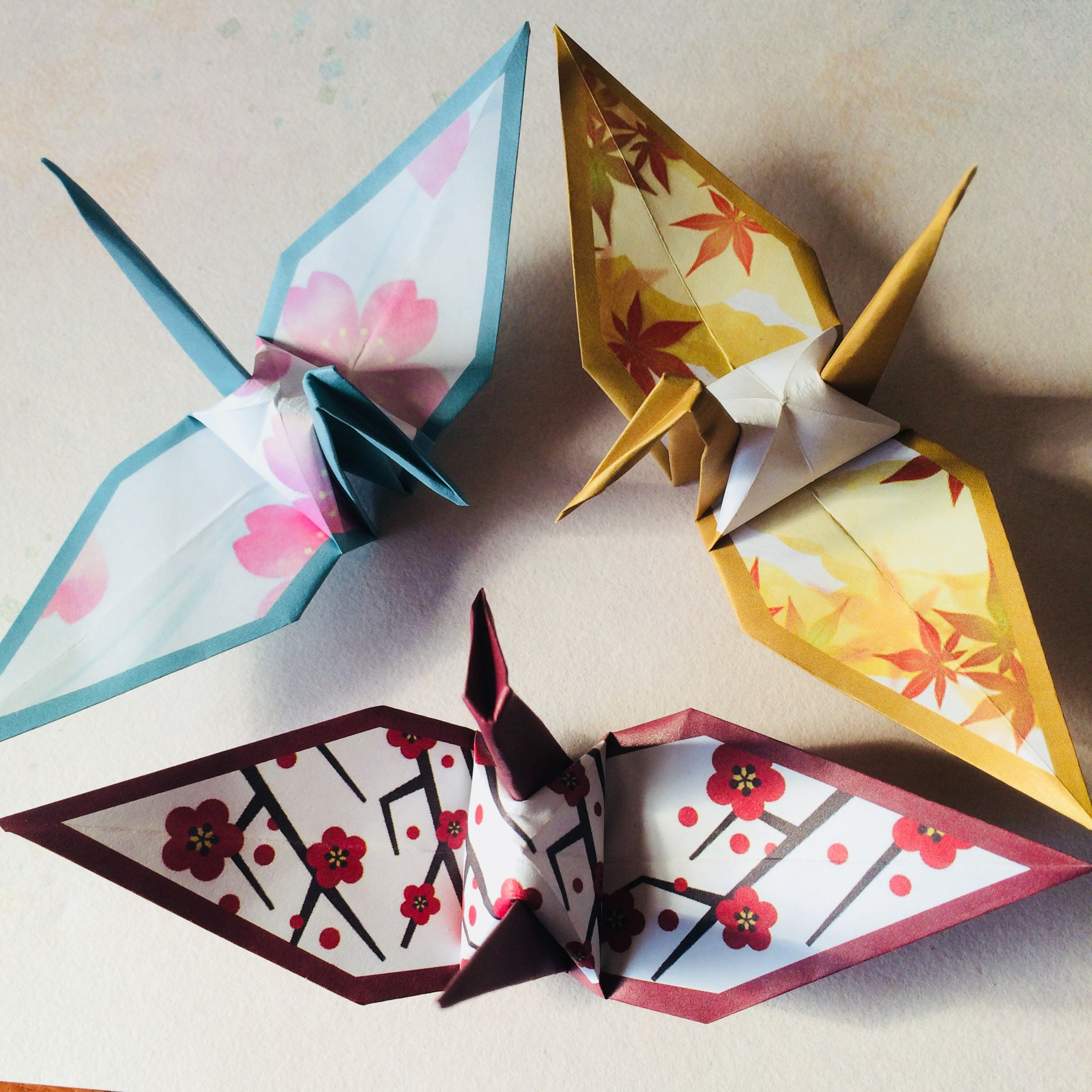 Origami crane suncatcher (plum flower)