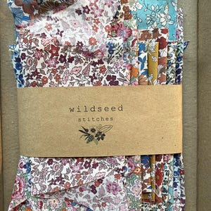 bundle of floral print fabrics