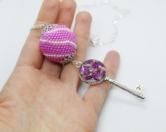 Fuchsia pink key necklace with real pressed flowers and beading ball, Beaded necklace with silver color key charm and flowers, Retro