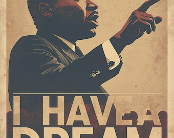 May include: A vintage-style poster featuring a portrait of Martin Luther King, Jr. in a dark suit, pointing with his right hand. The words "I HAVE A DREAM" are prominently displayed in large white letters, with the quote "MARTIN LUTHER KING, JR." above.