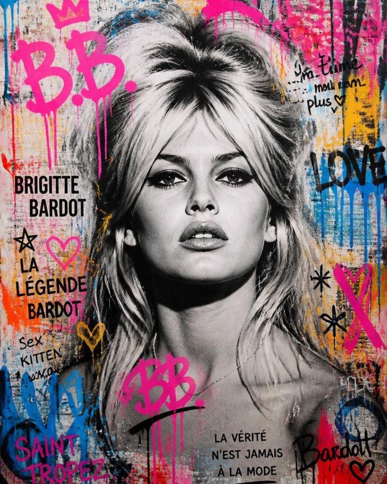 Puede incluir: Retrato en blanco y negro de Brigitte Bardot con acentos de estilo graffiti. La obra presenta salpicaduras de pintura rosa, azul, amarilla y naranja, y textos como "BB", "Brigitte Bardot" y "LOVE".