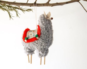 stuffed puffy peruvian llama christmas ornament with fringed blanket saddle gray with red fringe - Llama Christmas Decoration stuffed puffy peruvian llama christmas ornament with fringed blanket saddle gray with red fringe - Llama Christmas Decoration