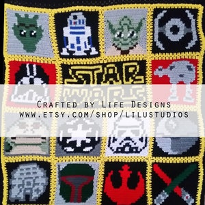 May include: A black crochet blanket with a Star Wars theme. The blanket features various characters and symbols from the Star Wars universe, including Yoda, Darth Vader, R2-D2, and the Millennium Falcon. The blanket is bordered with a yellow crocheted trim. The text "IN A GALAXY FAR, FAR, AWAY" is written in yellow yarn at the top and bottom of the blanket. The text "CRAFTED BY LIFE DESIGNS WWW.ETSY.COM/SHOP/LILUSTUDIOS" is written in white yarn in the center of the blanket.
