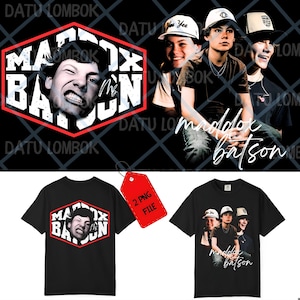 May include: Black t-shirts featuring the name "Maddox Batson" and images of Maddox Batson. One shirt has a graphic in a red and white hexagon. The other shirt has a photo of Maddox Batson.