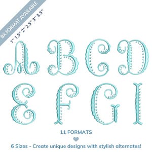 May include: A collection of stylized, light blue embroidered letters A, B, C, D, E, F, G, and I. The letters are in a decorative font with a scalloped edge and small dot details. Text at the top reads "BX FORMAT AVAILABLE" and at the bottom "11 FORMATS".