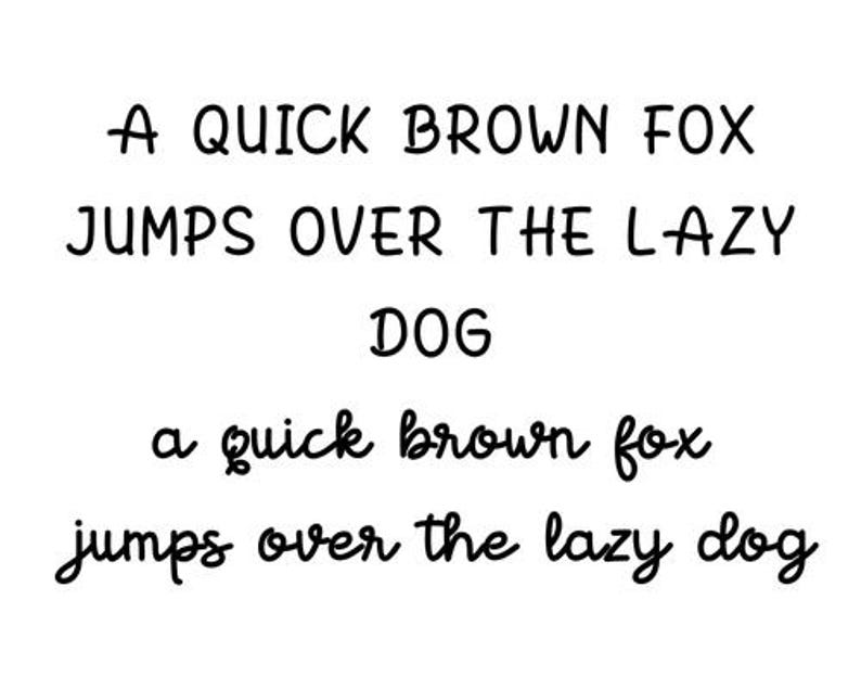 以下が含まれることがあります： 白い背景に、太字のサンセリフ体で「A QUICK BROWN FOX JUMPS OVER THE LAZY DOG」というフレーズ。 下には、同じフレーズが筆記体で繰り返されています。