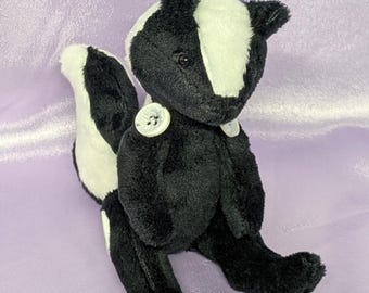 Handmade Mini Skunk Plush: Realistic & Cuddly Stuffed Animal, 6.5"