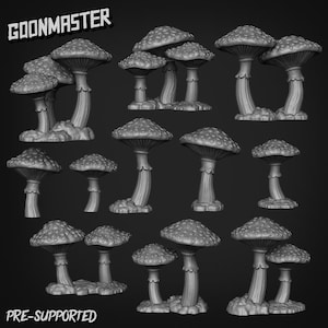 May include: A selection of grey, pre-supported mushroom models. The mushrooms feature textured caps and stems, with some grouped. The text "GOONMASTER" and "PRE-SUPPORTED" are visible.