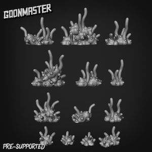May include: A set of grey, organic-looking 3D-printed models, possibly for tabletop gaming or miniature wargaming. The models have a textured, bulbous base with multiple, slender, curved protrusions. The text "GOONMASTER" and "PRE-SUPPORTED" are visible.