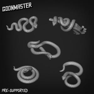 May include: A grayscale image displays five 3D-printed snake models in different coiled and curved positions. One snake is coiled around a branch. The text "GOONMASTER" is at the top, and "PRE-SUPPORTED" is at the bottom.
