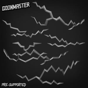 May include: A monochrome image showing multiple jagged, stylized cracks, likely for a 3D model or graphic design. The text "GOONMASTER" is at the top left, and "PRE-SUPPORTED" is at the bottom.