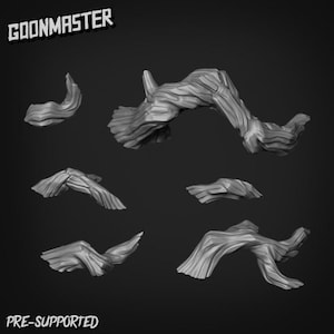 May include: Several grey, stylized wooden structures, likely for a craft project or model. The structures have a textured, organic appearance. The text "GOONMASTER" and "PRE-SUPPORTED" are visible in the image.