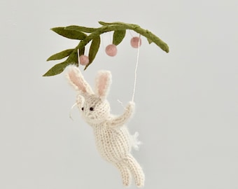 White Bunny Rabbit Baby Mobile, Knit Bunny Holding Greenery, Natural Fiber Gender Neutral Baby Room Art