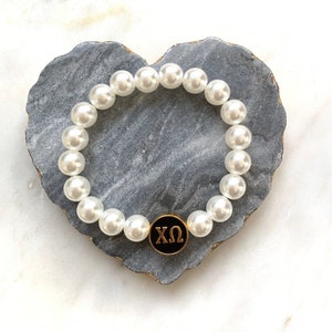 Chi Omega Sorority Bracelet: Faux Pearl Stretch Bracelet with Black Enamel